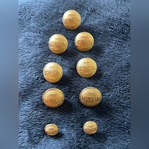 Vintage “Inspector” buttons. 7 large and 2 small.